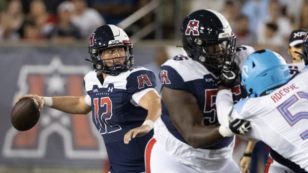 Feb 26, 2023; Houston, TX, USA; Houston Roughnecks quarterback Brandon Silvers (12) drops back to pass against the Arlington Renegades in the first quarter at TDECU Stadium. Mandatory Credit: Thomas Shea-USA TODAY Sports  